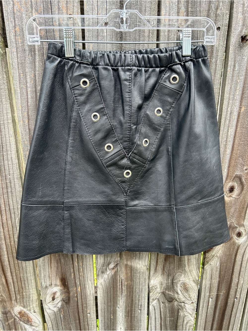 The Ragged Priest Black Faux Leather Grommet Mini Skirt